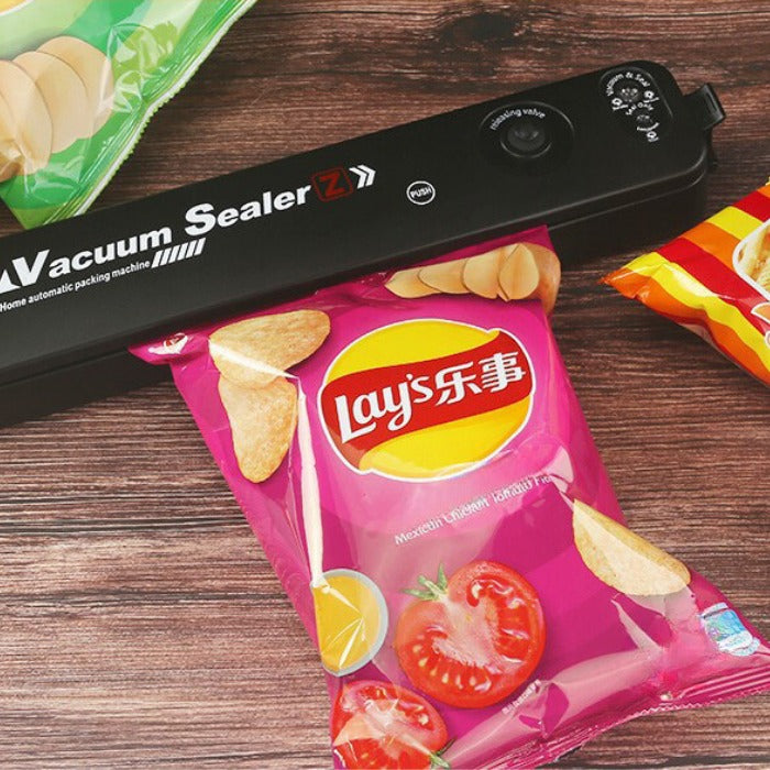 Vacuum Sealer + 5 Bags